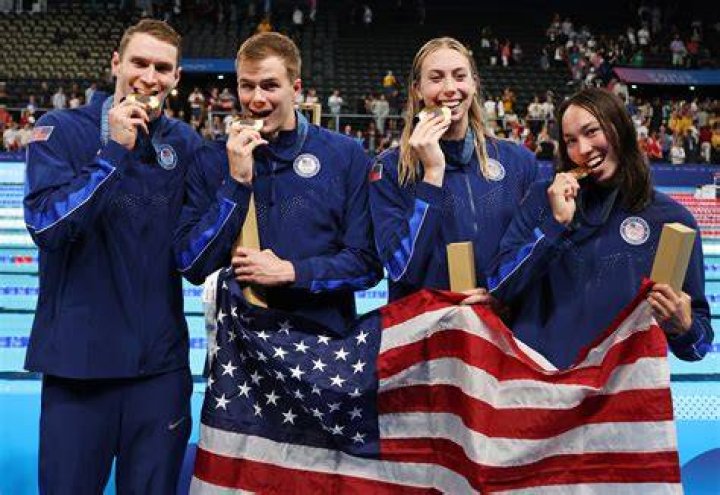 2021 Olympics USA makes swim history in Tokyo; Katie Ledecky wins 1st