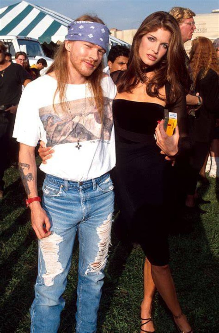 Axl Rose with Stephanie Seymour and her baby son Dylan, early '90s 