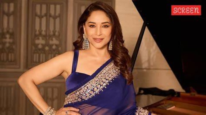 Bollywood Madhuri Dixit With Her Family In Images And Wallpapers 2011
