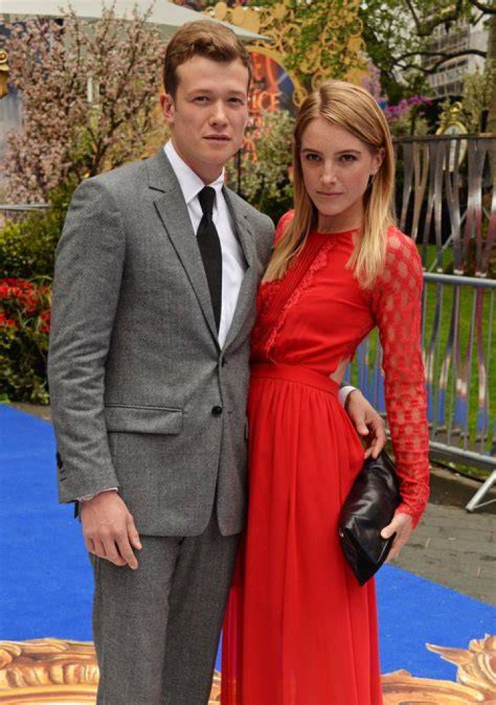 Ed Speelers and Asia Macey attending the 72nd British Academy Film
