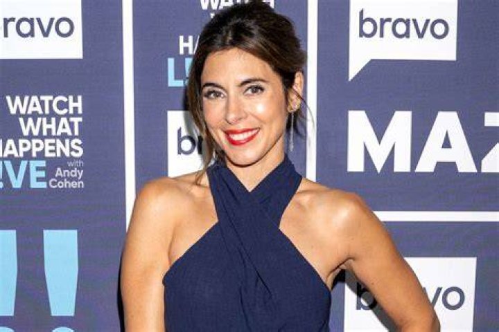 JamieLynn Sigler and fianc&eacute; Cutter Dykstra pose with baby son Beau in