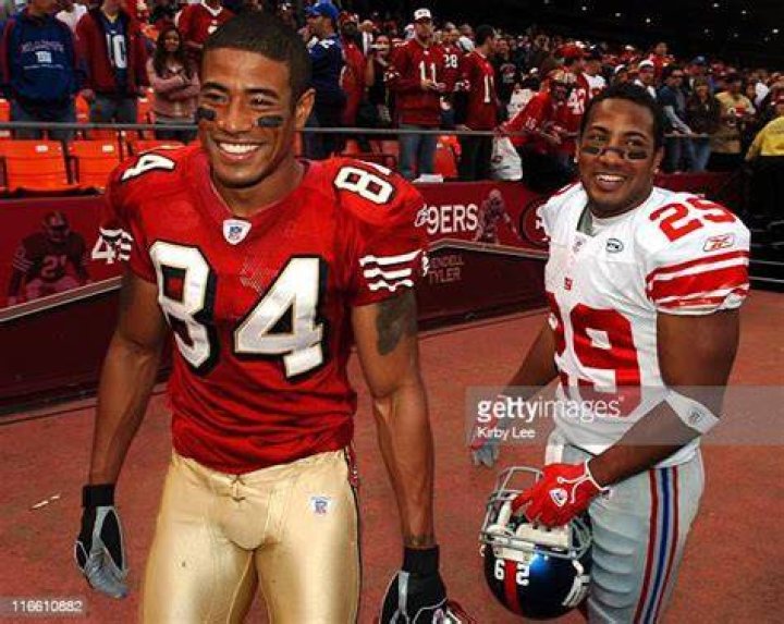 Johnnie Morton of the San Francisco 49ers runs on to the field during