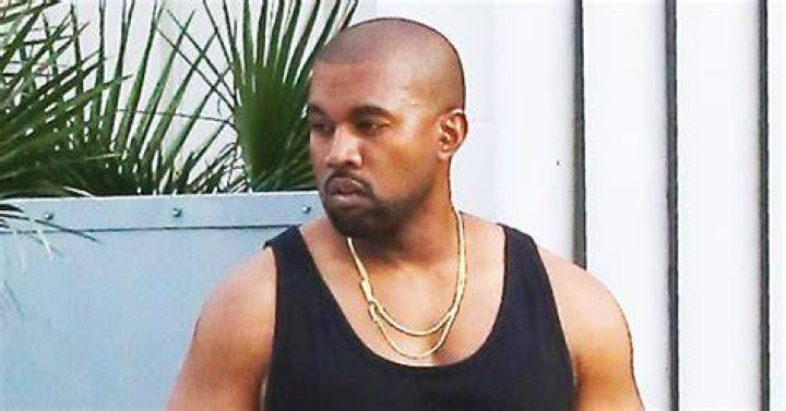 Kanye Shows Off Buff Biceps on Outing With Kim Kardashian