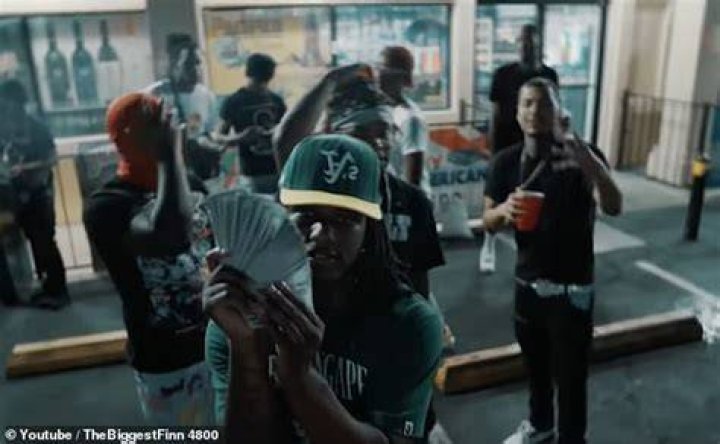 Kenjuan McDaniel, a rapper accused of murder, is arrested after