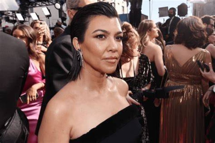 Kourtney Kardashian Claps Back at a Fan Who Says She Has a &lsquo;Pregnant