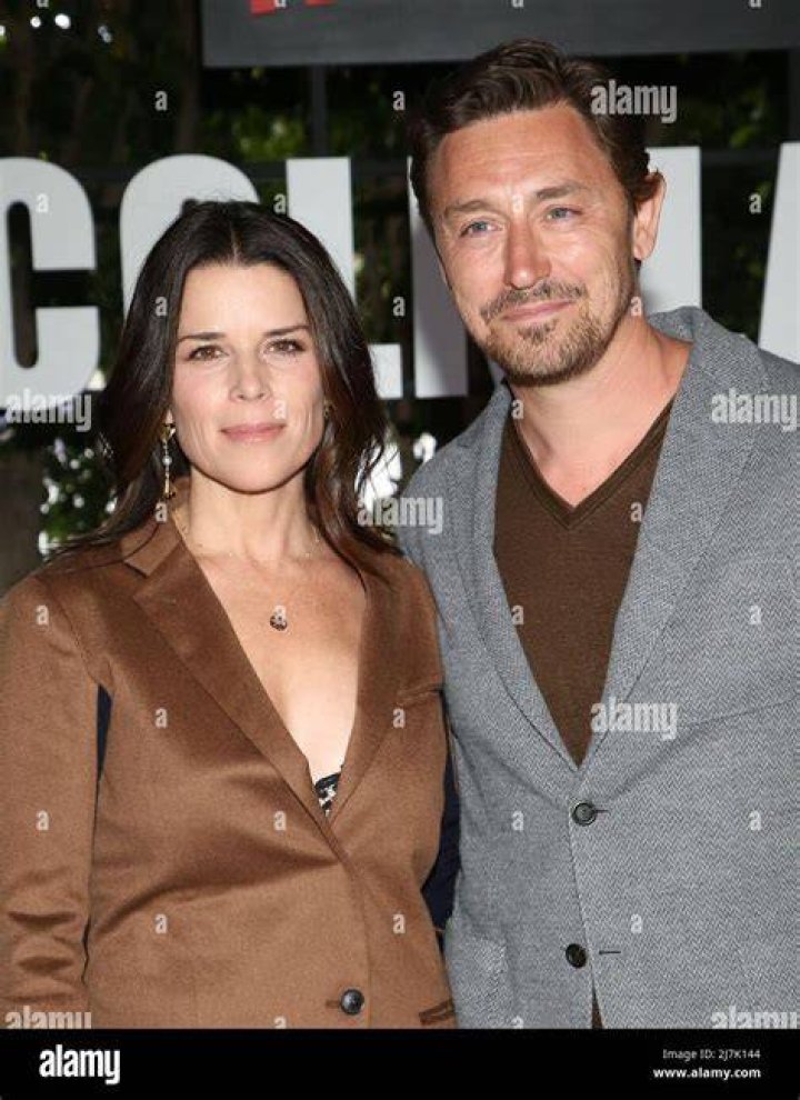Neve Campbell & JJ Feild from Emmys 2017 Red Carpet Couples E! News