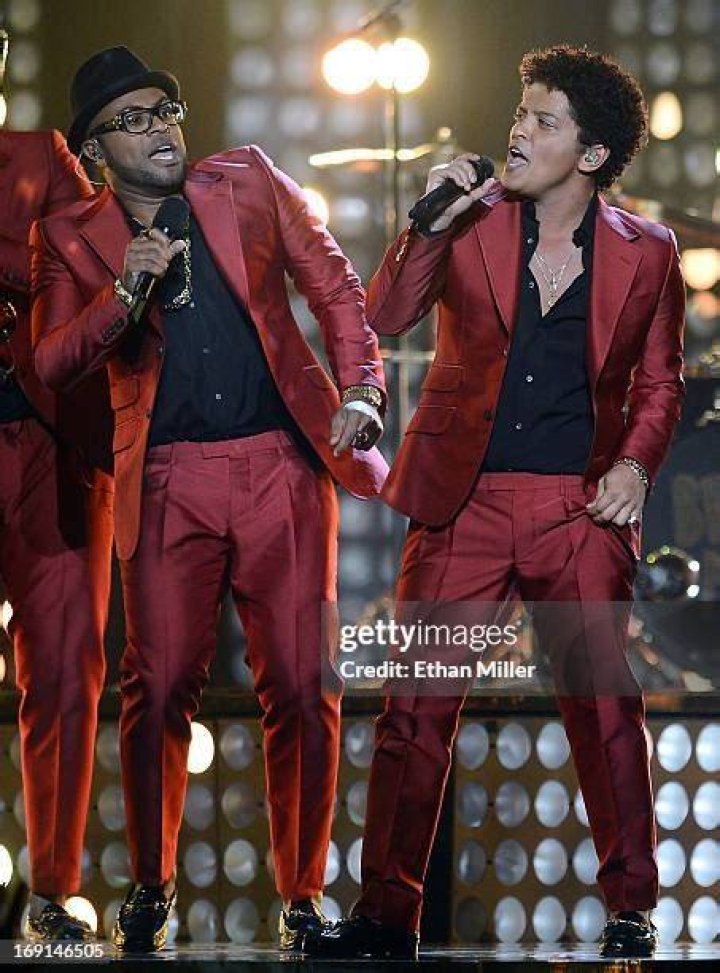 Singer/songwriter Philip Lawrence (L) and Bruno Mars perform during the
