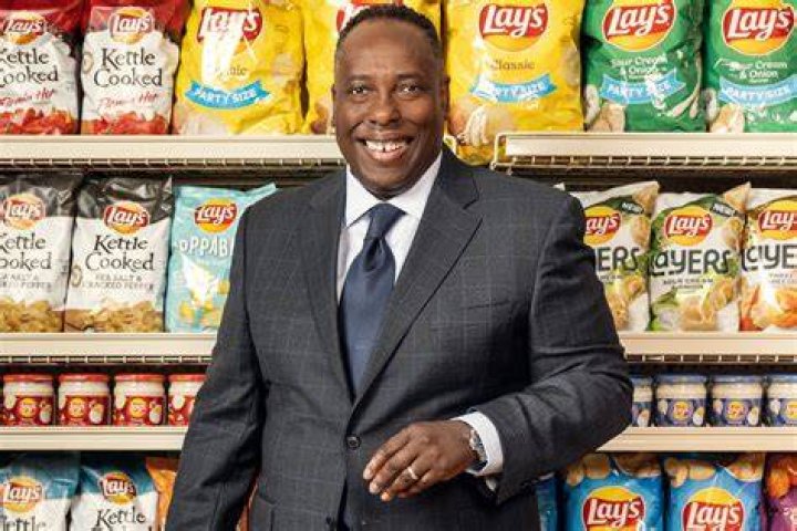 Steven Williams, CEO of PepsiCo Foods North America, beams while